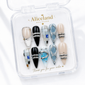 Arctic Chrome almond press on nails with metallic silver, glossy black and icy blue futuristic nail art