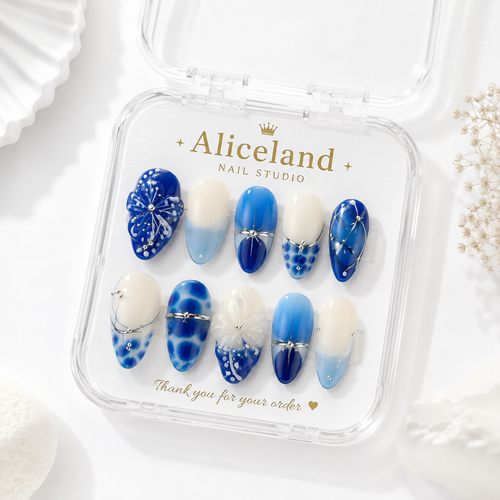 Azure Blossom almond press on nails featuring blue porcelain-inspired nail art with handcrafted 3D flowers