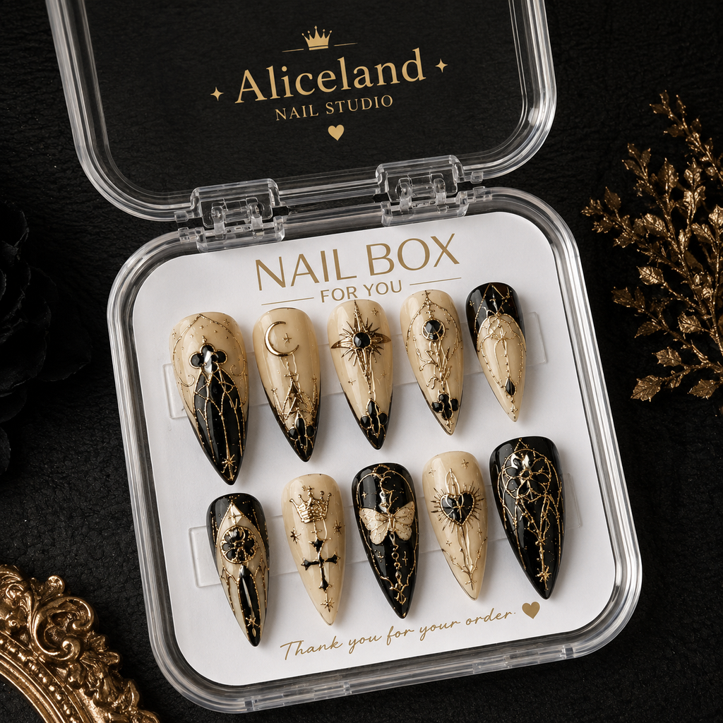 Celestial Noir stiletto press on nails with moon, stars and gothic gold artwork