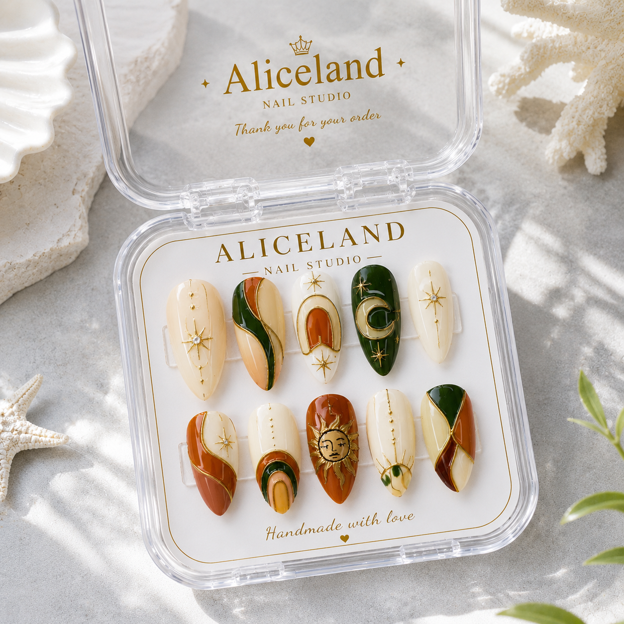 Celestial Terra almond press on nails with celestial sun moon artwork, forest green, terracotta and luxury gold detailing