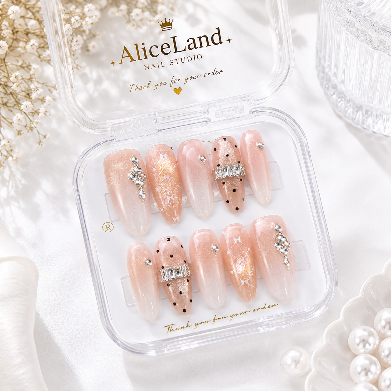 Champagne Glow almond press on nails with glitter ombre and rhinestone accents