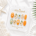Mediterranean Citrus almond press on nails with handcrafted 3D orange slices, daisy flowers and soft blue summer nail art