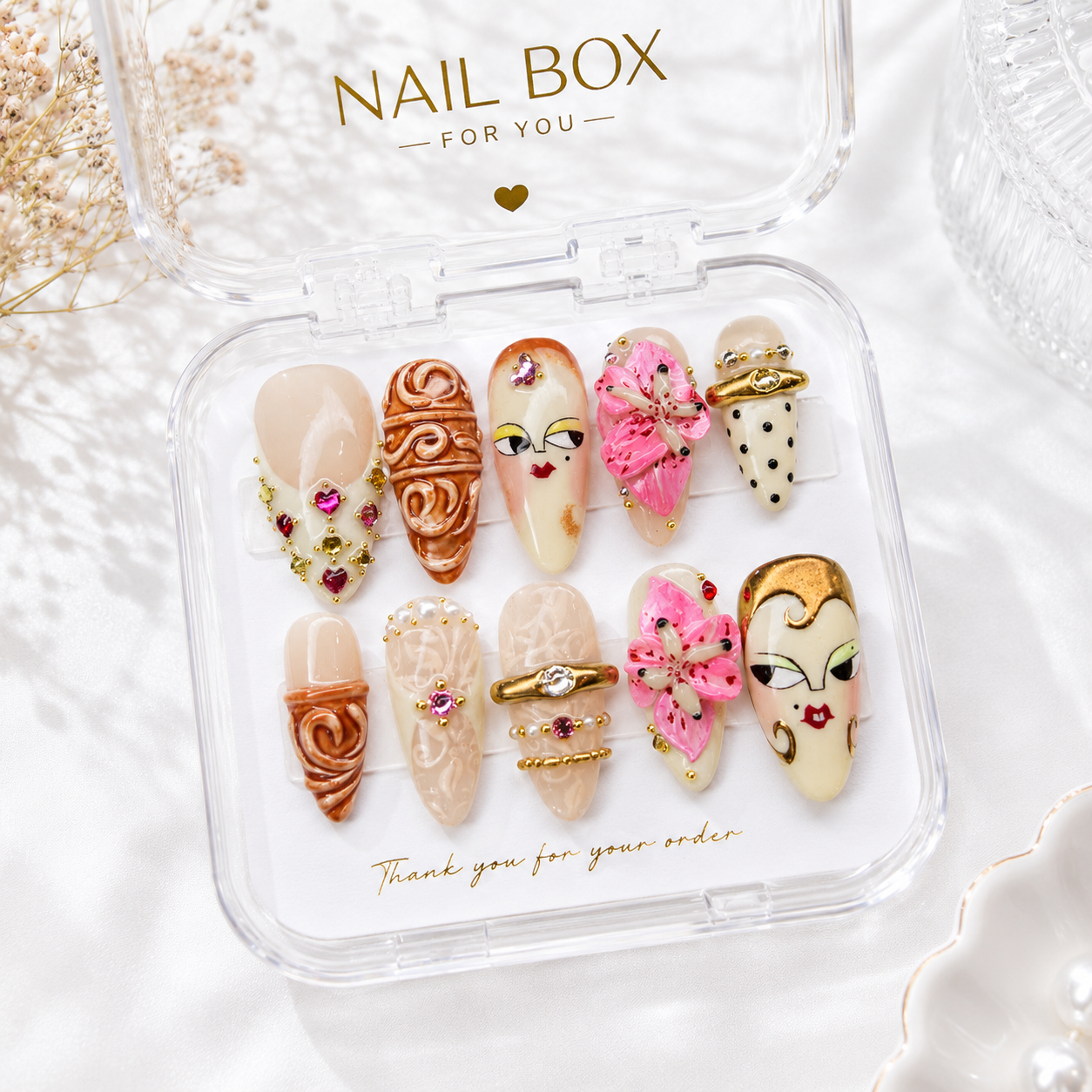 Muse Bloom almond press on nails with abstract face art and 3D lily flower design