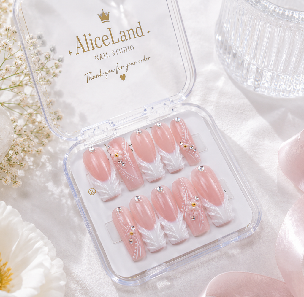 Pearl Whisper almond press on nails with white botanical accents and pearl details