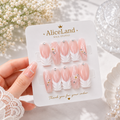 Pearl Whisper almond press on nails with white botanical accents and pearl details